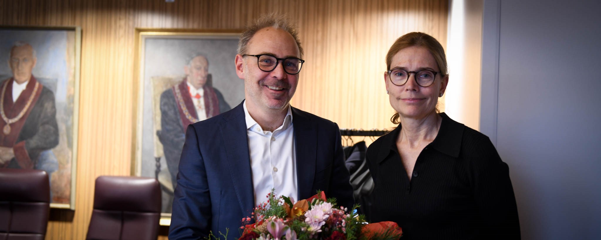 Karen Helene gives Helge flowers