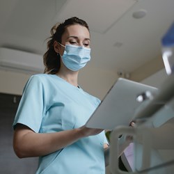 Female nurse holding a clipboard