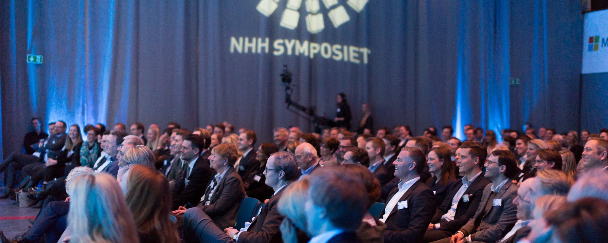 The Aula filled with audience members at a former NHH Symposium.