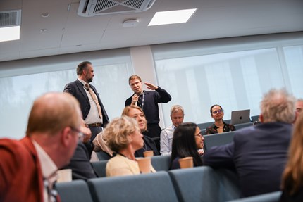 Person in the audience asking a question.