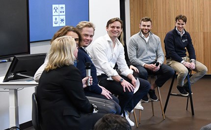 NHH student Harald S. Stensaker (white shirt) with fellow students  and senior leaders during the discussion session. Photo: Ingunn Gjærde