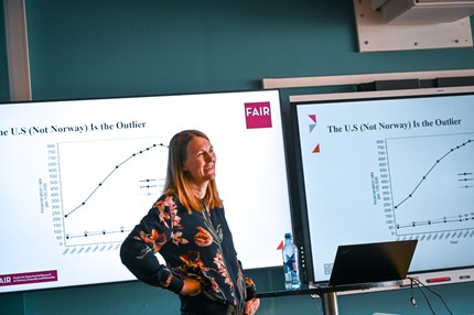 Løken holding a lecture