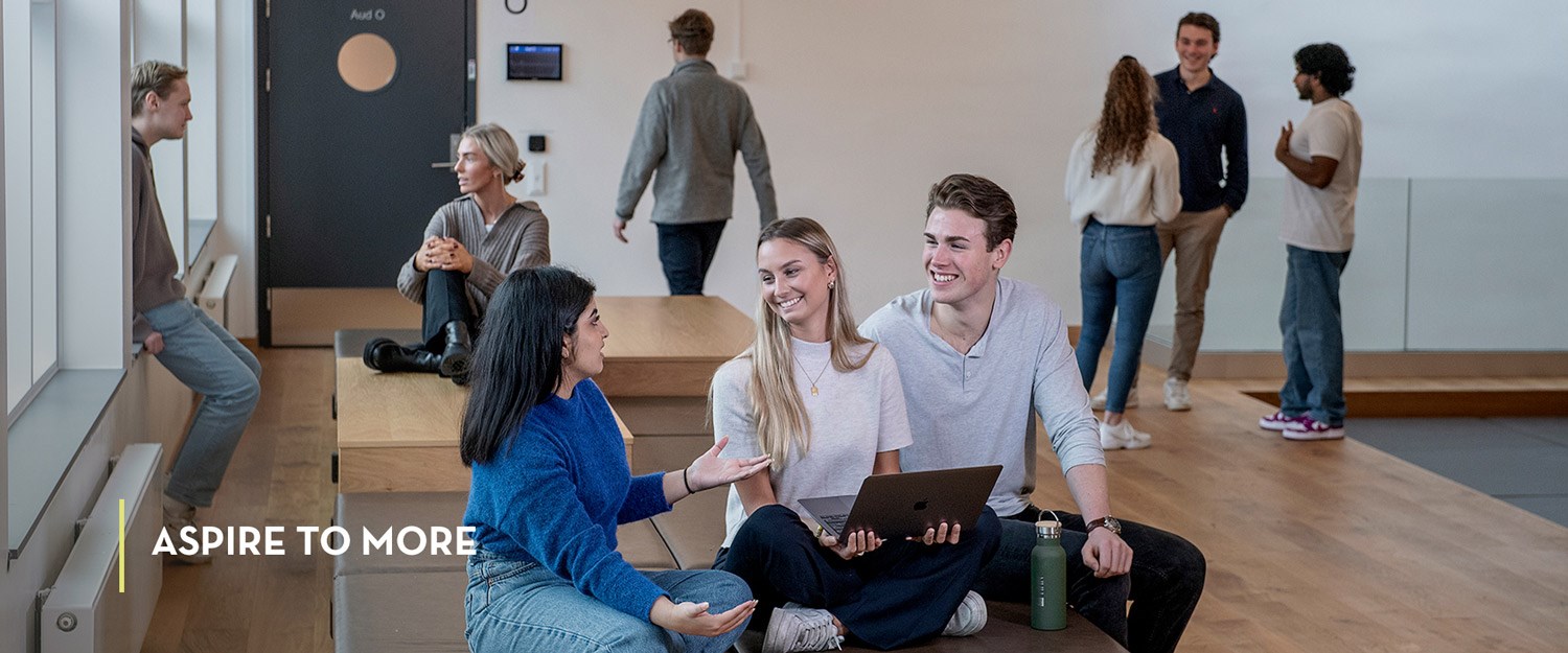 Students smiling. Photo: Helge Skodvin