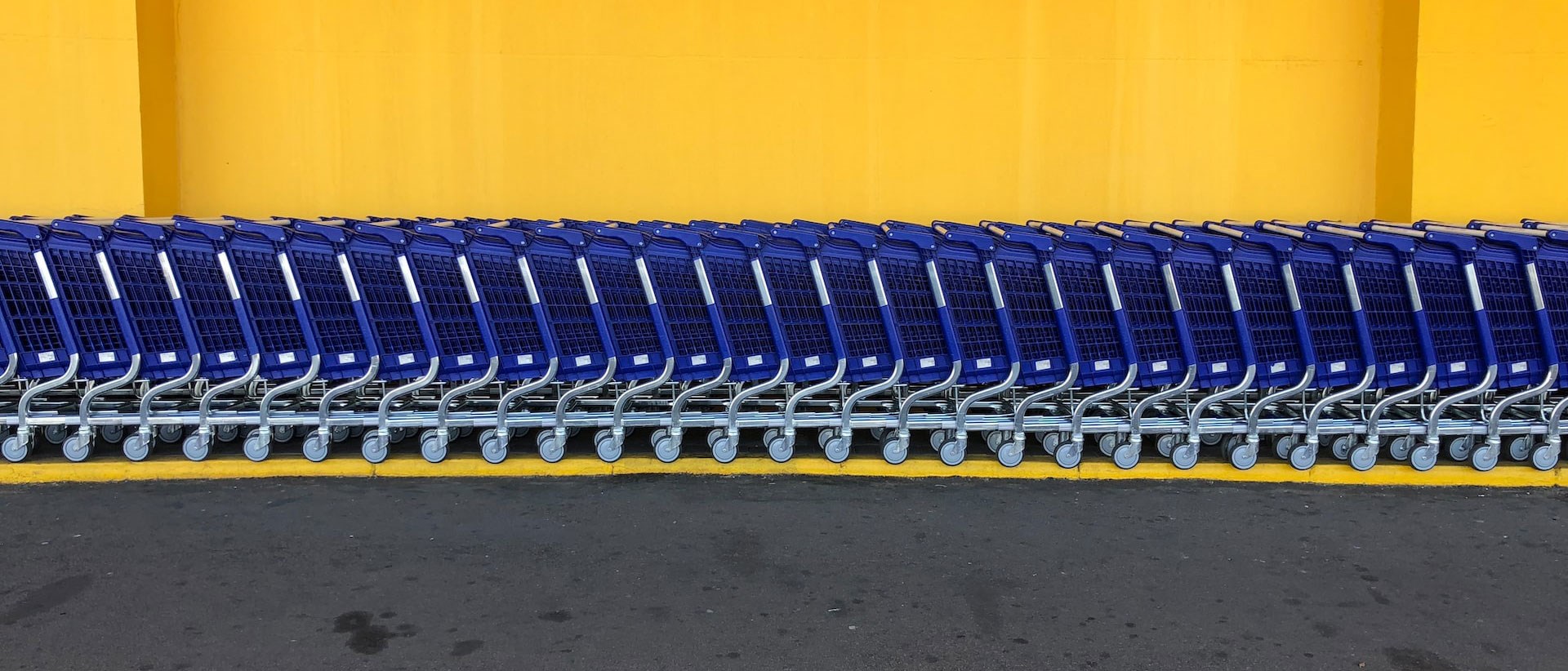 A row of shopping carts. Photo: Unsplash