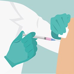 Person getting a vaccine in the arm