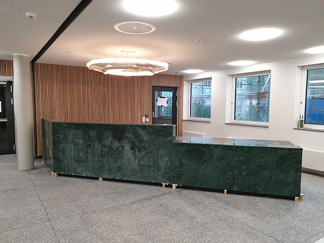 The inside of the main entrance with a very nice marble counter.