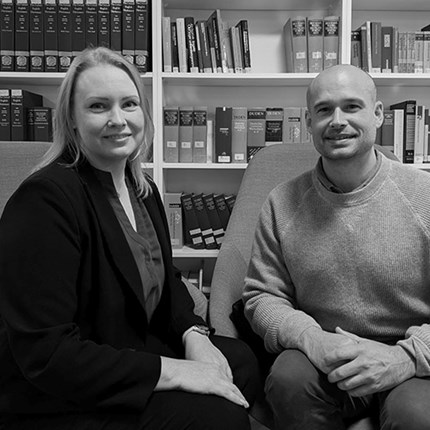 Kaisa and Gavin sitting in the office
