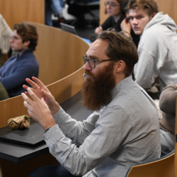 students and professor at lecture