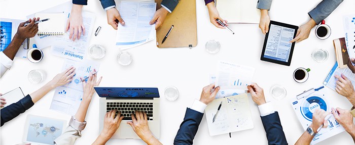 Business people cooperating. Photo: Shutterstock