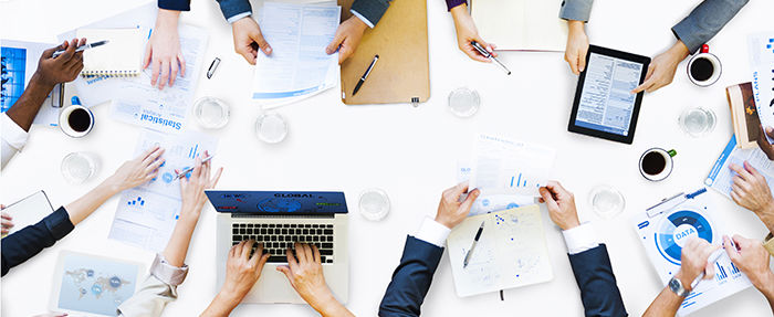 Business people cooperating. Photo: Shutterstock