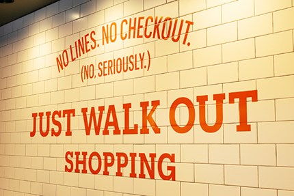 Words on Amazon One store wall. Photo: Michaelvi/Dreamstime