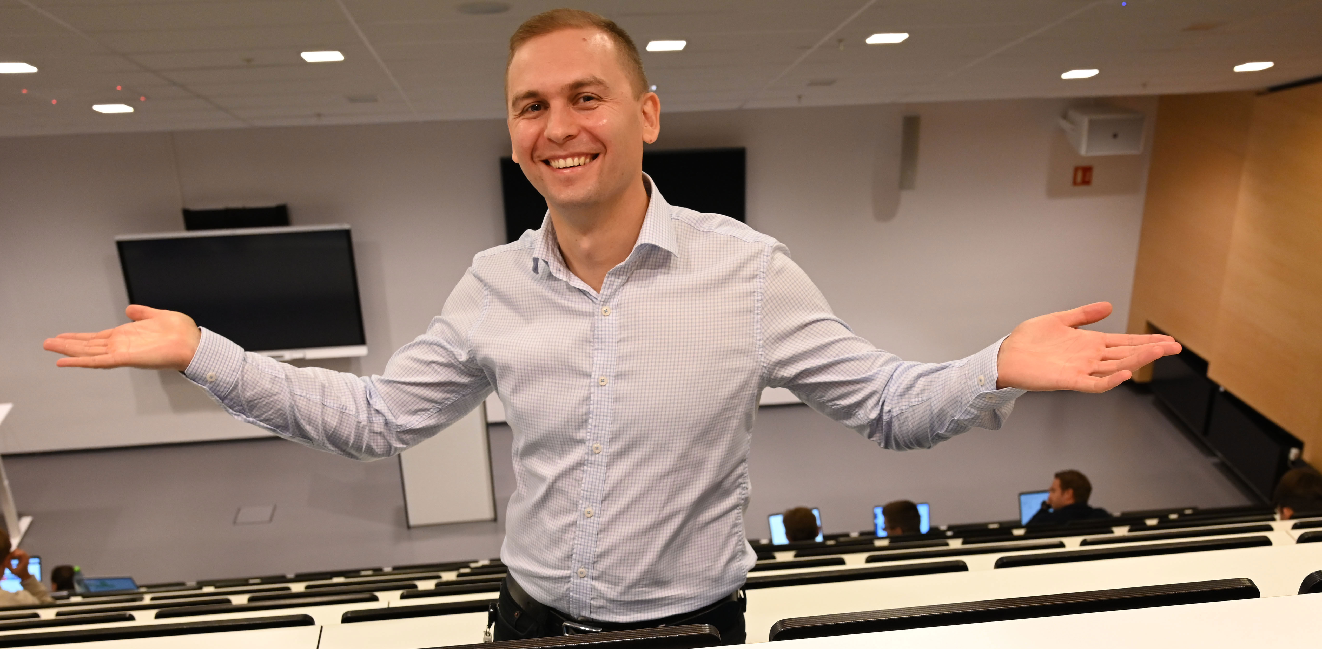 Ivan Belik in empty auditorium