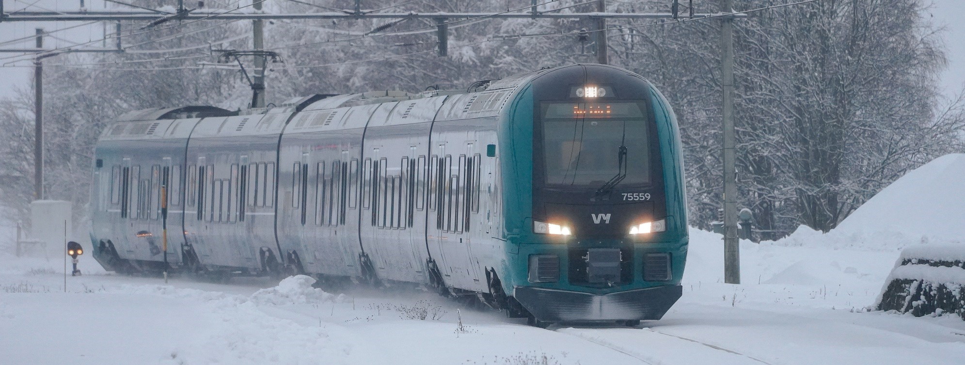 Tog, vinter. Av wikimedia, Øyvind Holmstad